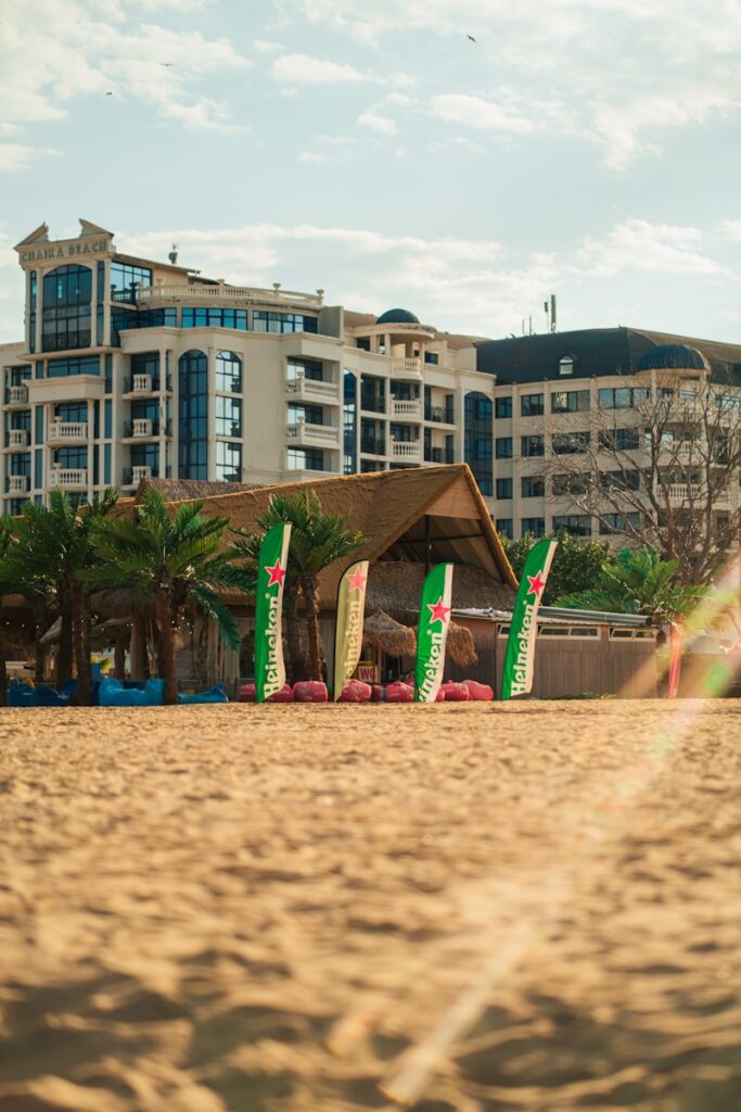 A beach area with buildings in the background